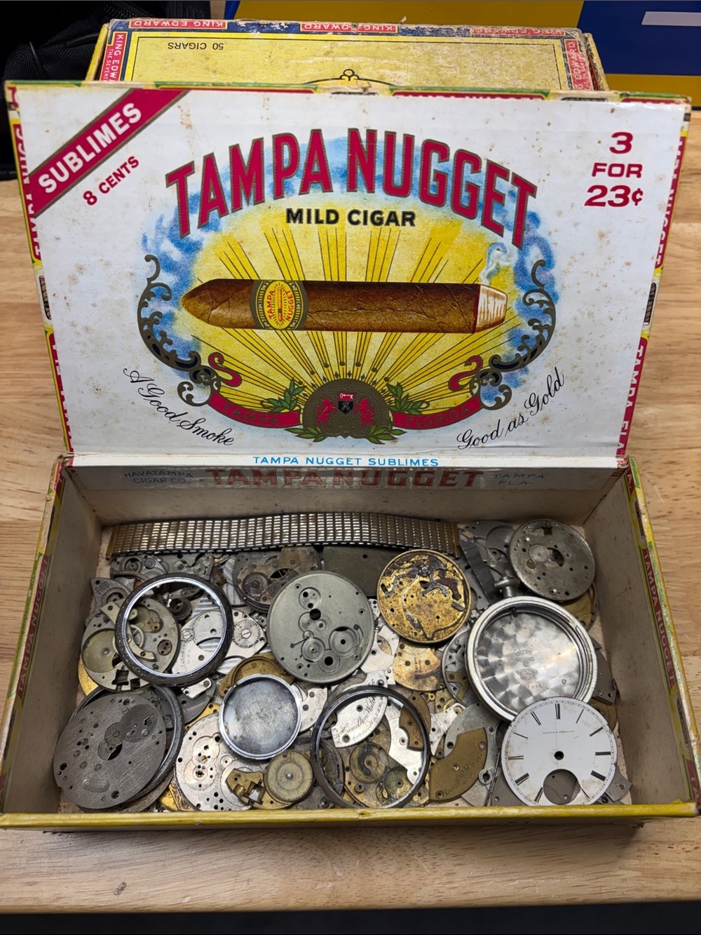 Vintage Tampa Nugget cigar box with old watch parts